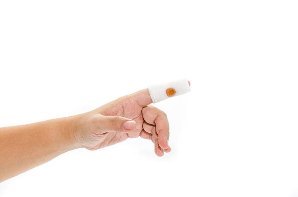 istock Wounded woman finger bandaged with plaster 528610803