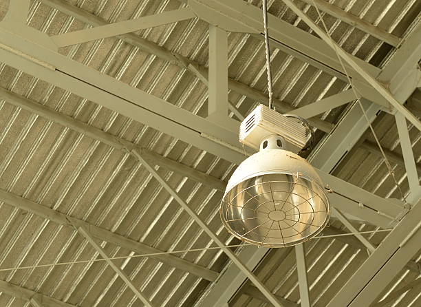 istock aluminium lamp in factory 528610853