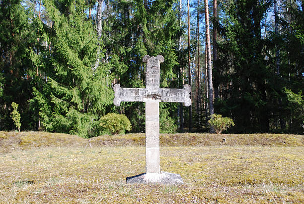 istock Old cross on the 19th - 20th century cemetery. 528611556