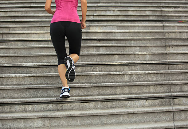 istock Runner athlete running on city stairs. 528612551