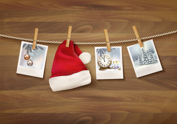 istock Holiday background with christmas photos and a santa hat. Vector 528612877