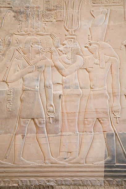 istock carving figures in Kom Ombo Temple 528615822