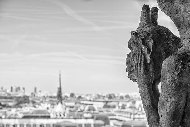 istock notre dame gorgoyle paris view 528616696