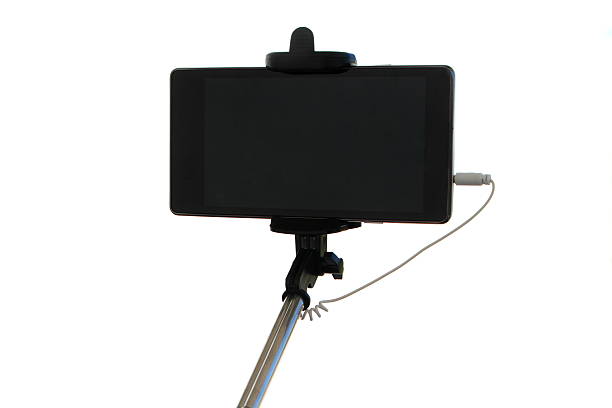 istock selfie stick and mobile phone 528616770