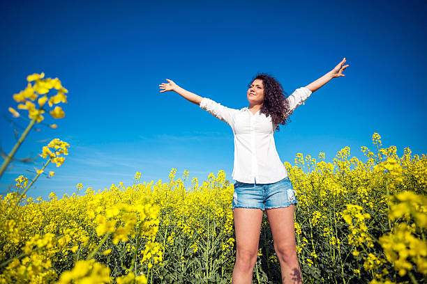 istock young beautiful girl in the field 528617398