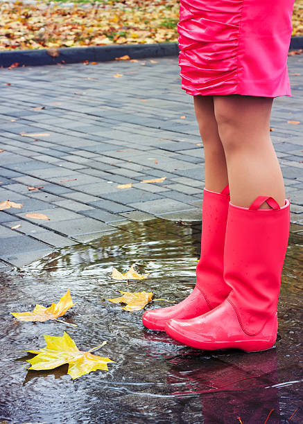 istock Woman in rain boots 528618626