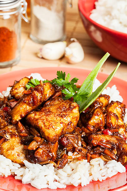 istock Sweet and sour pork and rice 528619914