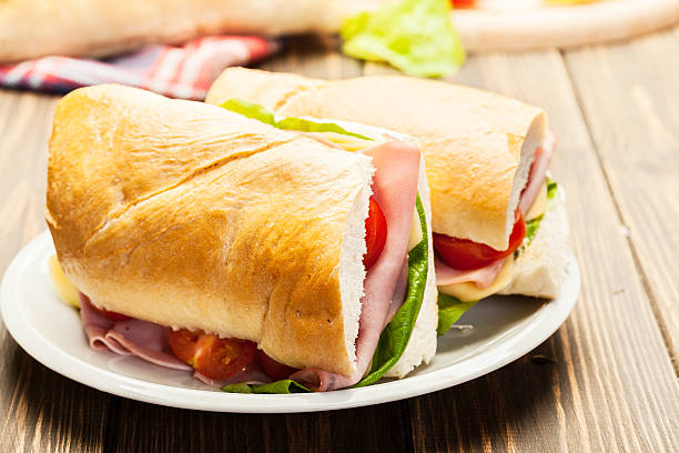 istock Italian panini sandwich with ham, cheese and tomato 528620054