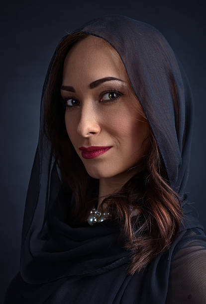 istock beautiful woman in black 528620246