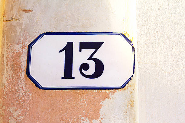 istock Number 13 Ceramic Address Plaque in Pastel-Pink Wall 528621028