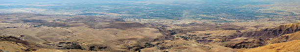Mount Nebo to the Jordan River Valley Panoramic view from Mount Nebo to the Jordan River Valley mount nebo jordan stock pictures, royalty-free photos & images