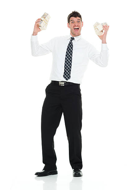 istock Smiling businessman holding money 528628174