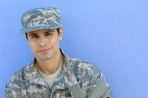 istock Happy healthy ethnic army soldier smiling 528631094