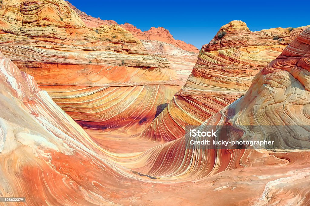 The Wave, plateau from red sandstone in form ocean waves. The Wave, plateau from red sandstone in the form of ocean waves. The Wave - Coyote Buttes Stock Photo