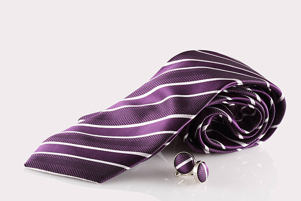 purple tie with cuff links stock photo