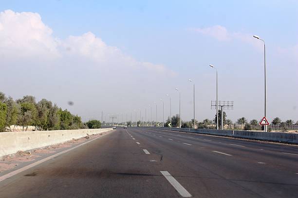 istock Straight wide and long road 528634089