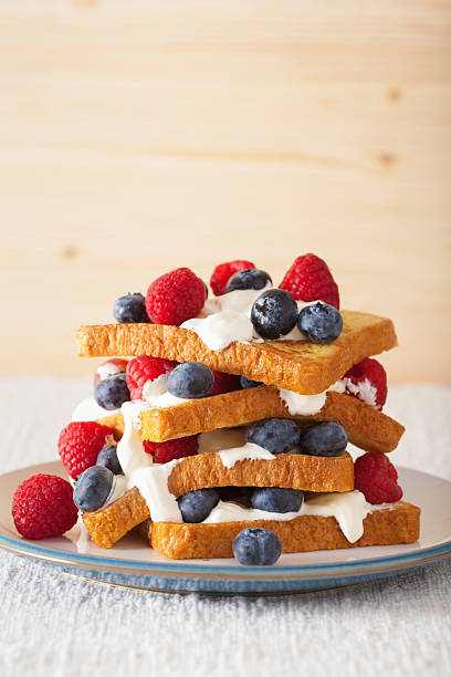 istock french toasts with creme fraiche and berries for breakfast 528634388