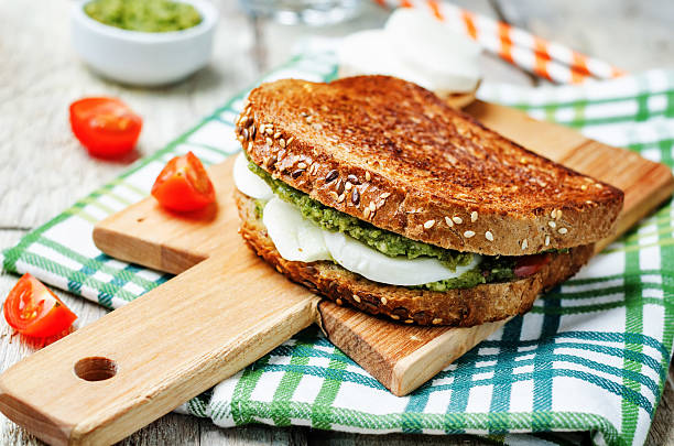 istock Pesto Mozzarella tomatoes grilled rye sandwich 528634906