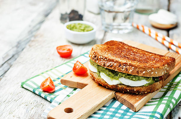 istock Pesto Mozzarella tomatoes grilled rye sandwich 528634928