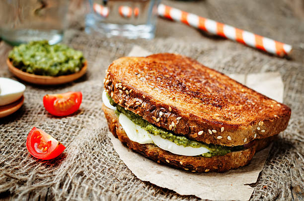 istock Pesto Mozzarella tomatoes grilled rye sandwich 528634948
