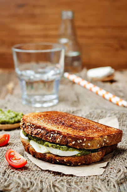 istock Pesto Mozzarella tomatoes grilled rye sandwich 528634958
