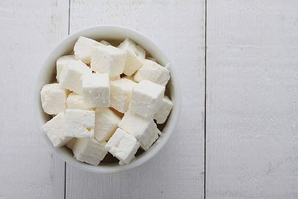 istock feta goats cheese cubes in dish 528635159