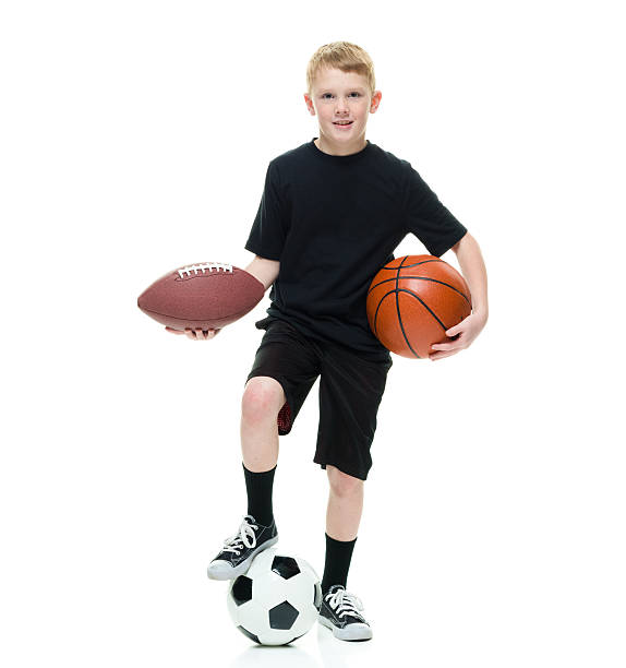 istock Boy with sports balls 528637300