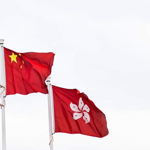 istock China and Hong Kong flags 528637470