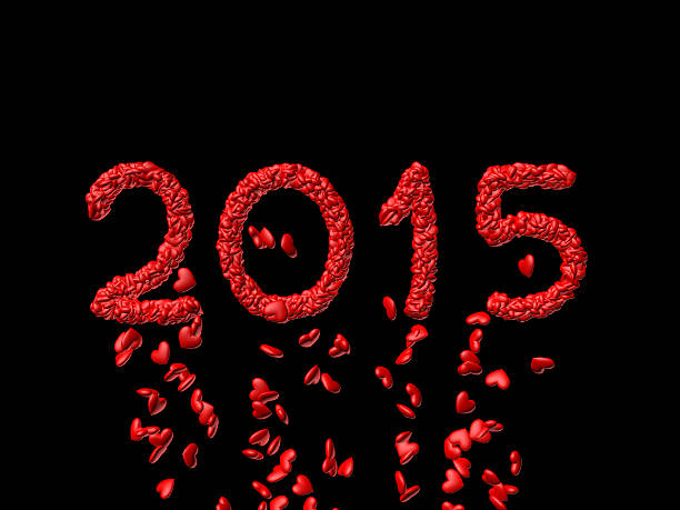 istock New year 2015 made from the hearts - black background 528638129