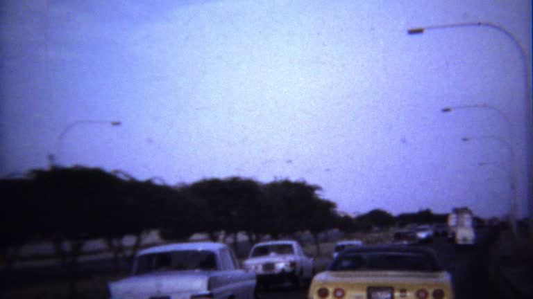 1974: Roadside new construction wealthy mansion houses.