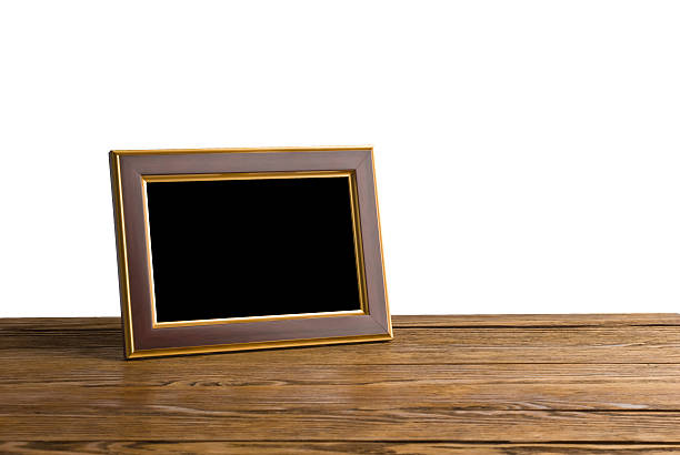 istock old photo frame on the wooden table 528678133