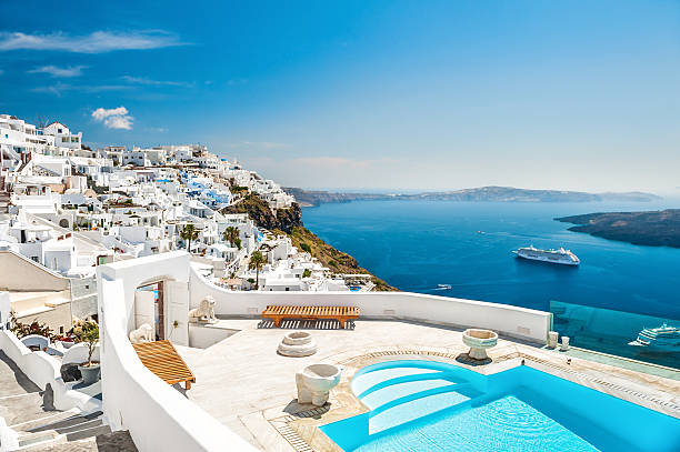 White architecture on Santorini island, Greece White architecture on Santorini island, Greece. Swimming pool in luxury hotel. Beautiful view on the sea greek islands stock pictures, royalty-free photos & images