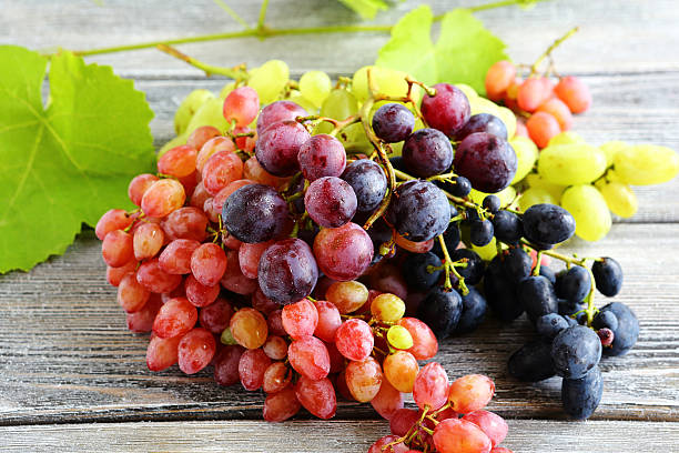 istock Grapes on a wooden boards 528680179