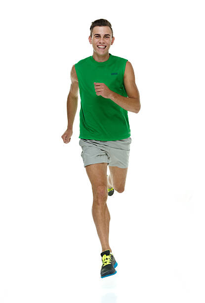 istock Smiling male athlete running 528683357