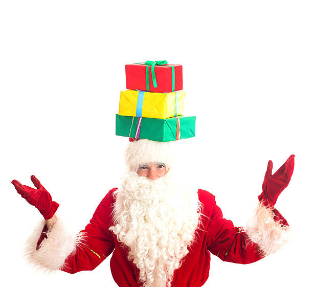istock Santa Claus with gifts on his head. 528683563
