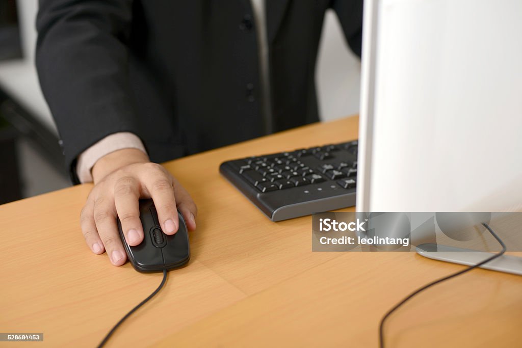 Business man typing with keyboard Business man typing with keyboard on wooden desk Adult Stock Photo