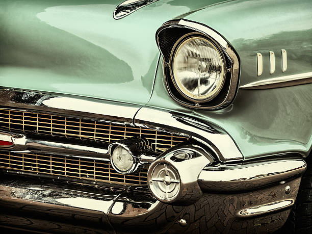 Retro styled image of a front of a classic car Retro styled image of a front of a green classic car 1940s style stock pictures, royalty-free photos & images