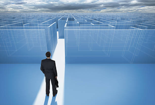 Make a decision. Achieving the goal. Businessman standing in front of the entrance to the maze. Without the sign "Welcome" on the wall. Wide angle. Blueprint. maze road street confusion stock pictures, royalty-free photos & images