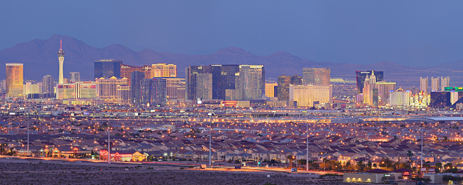 Las Vegas, United States - November 24, 2022: A panorama picture of Las Vegas at night, with the Strip on the right and the T-Mobile Arena on the left.