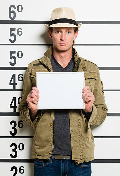 istock Mugshot of a Young Man 528709447