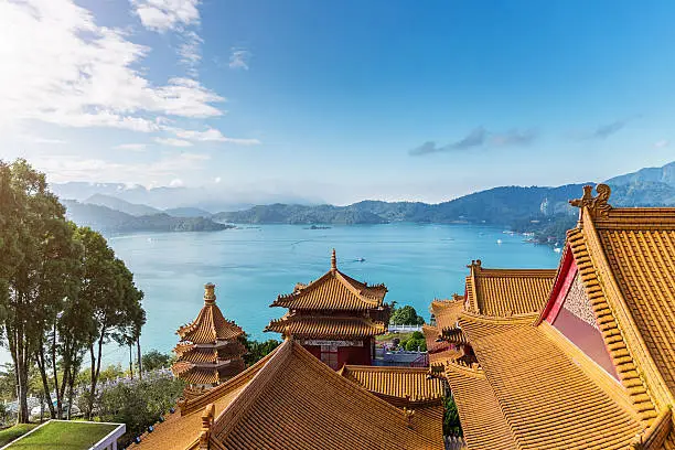 Sun Moon Lake on a sunny day, view over the rooftops of Wenwu Temple, Taiwan.