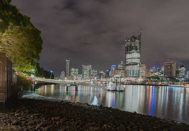 istock Brisbane city skyline lights across river at night 528712504