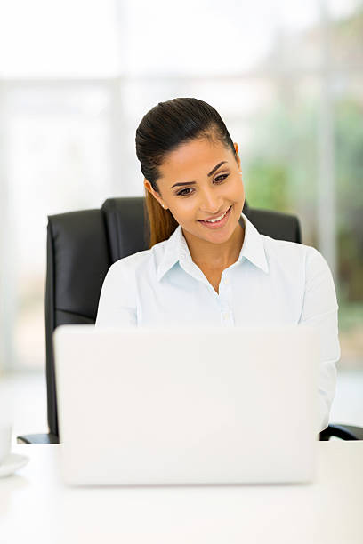istock young businesswoman working on laptop 528713237
