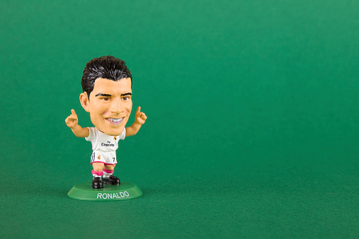 Zgierz, Poland - December 14, 2014: Figurines made by Soccer Starz. In the picture figurine footballer Ronaldo. Is sponsored by Fly Emirates.