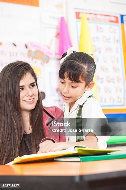 Story Time In The Clasroom Stock Photo - Download Image Now - 4-5 Years, 6-7 Years, Adult