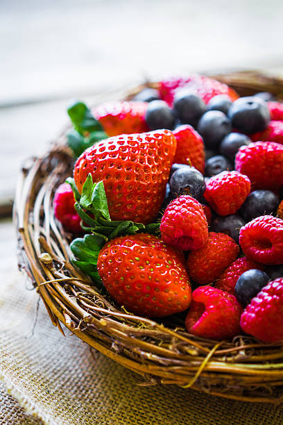 istock Berries on wooden background 528713636