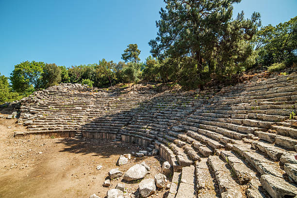 древней театр в античный город фаселис, destrict анталия, турция - anatolya стоковые фото и изображения