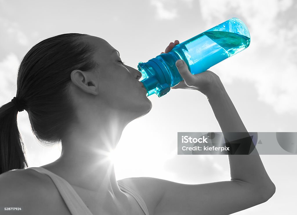 Drinking water concept Woman drinking water. Drinking Stock Photo