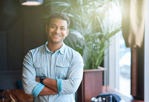 istock Cheerful male businessman is working in cafe 528720042