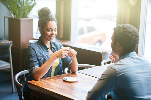 istock Pretty two lovers are dating in restaurant 528720250